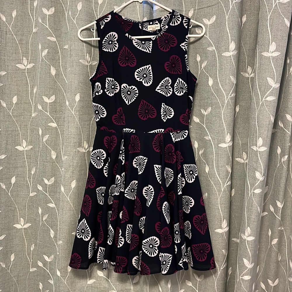 Dark blue dress with purple and white designs